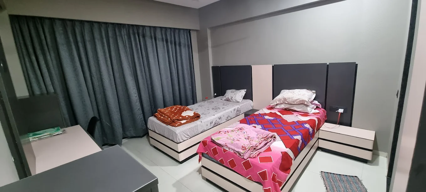 Sharanya Maison Hostel background image