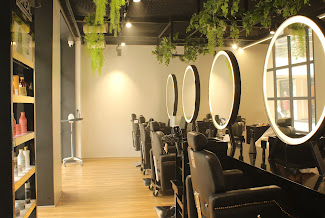 Nirav Hairstorm Unisex  logo