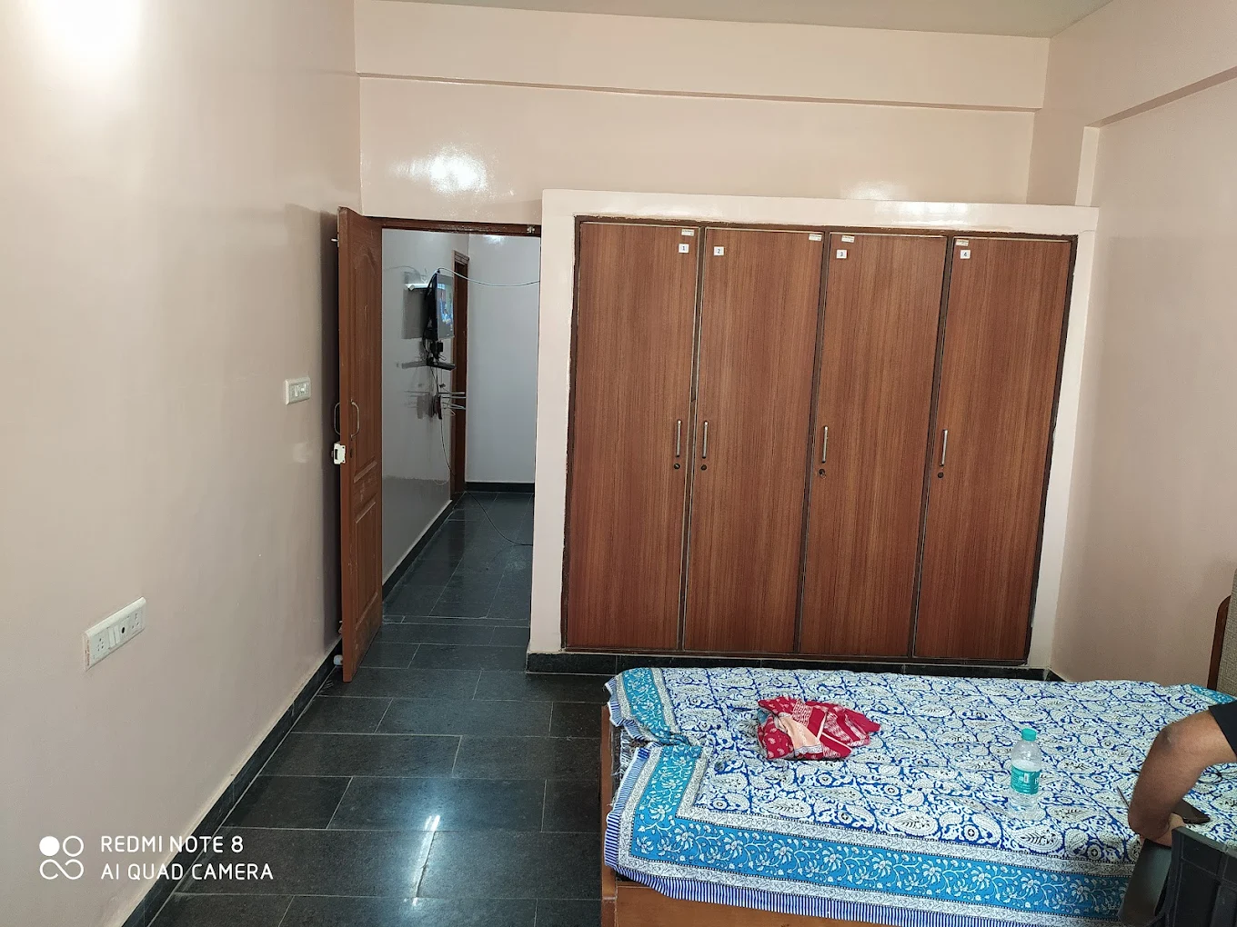 Dhanvi Gents PG & logo